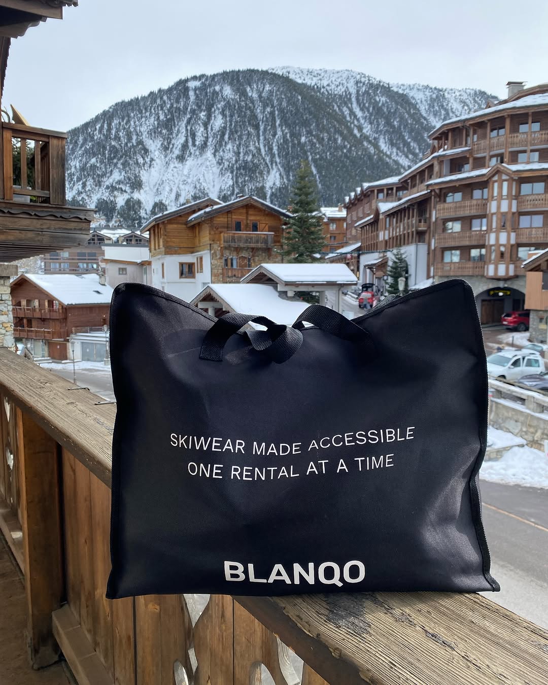 Blanqo skiwear rental: red ski suit with furry hood